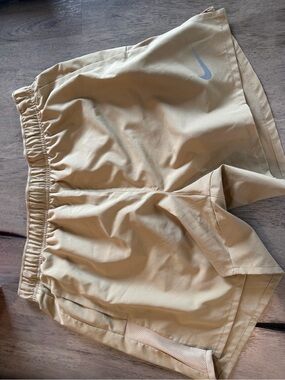 Nike Gold Athletic Running Shorts with Reflective Swoosh 5”